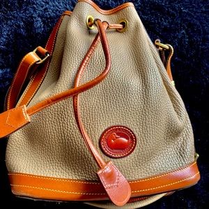 Dooney & Bourke drawstring bag (NWOT) Italian Pebble Leather